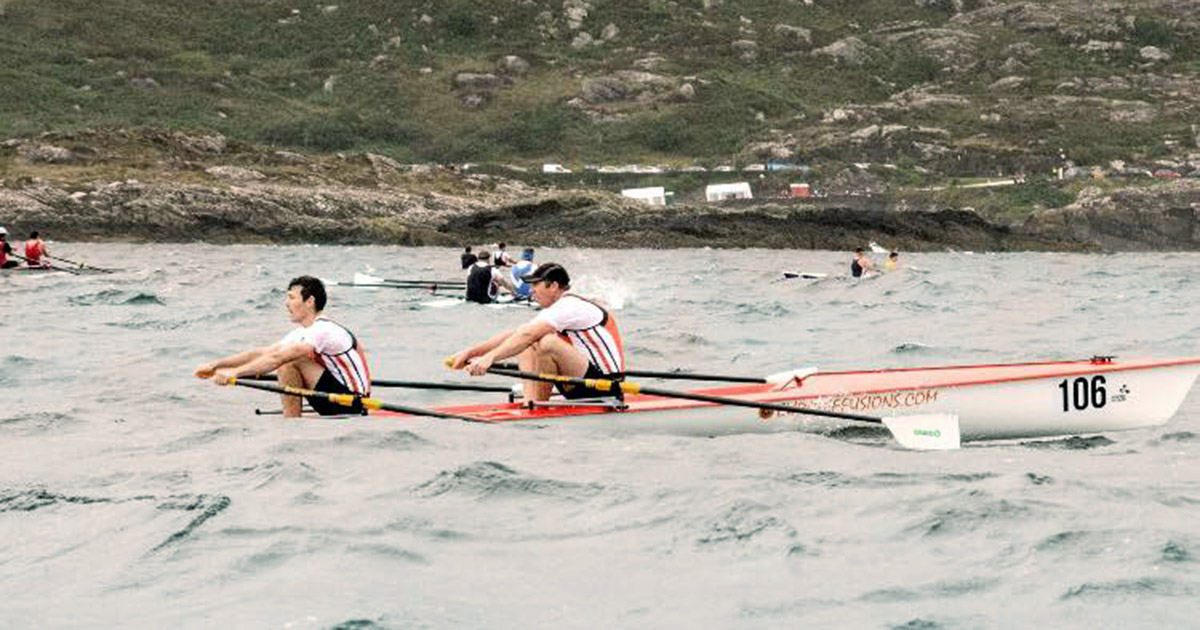 group of men rowing